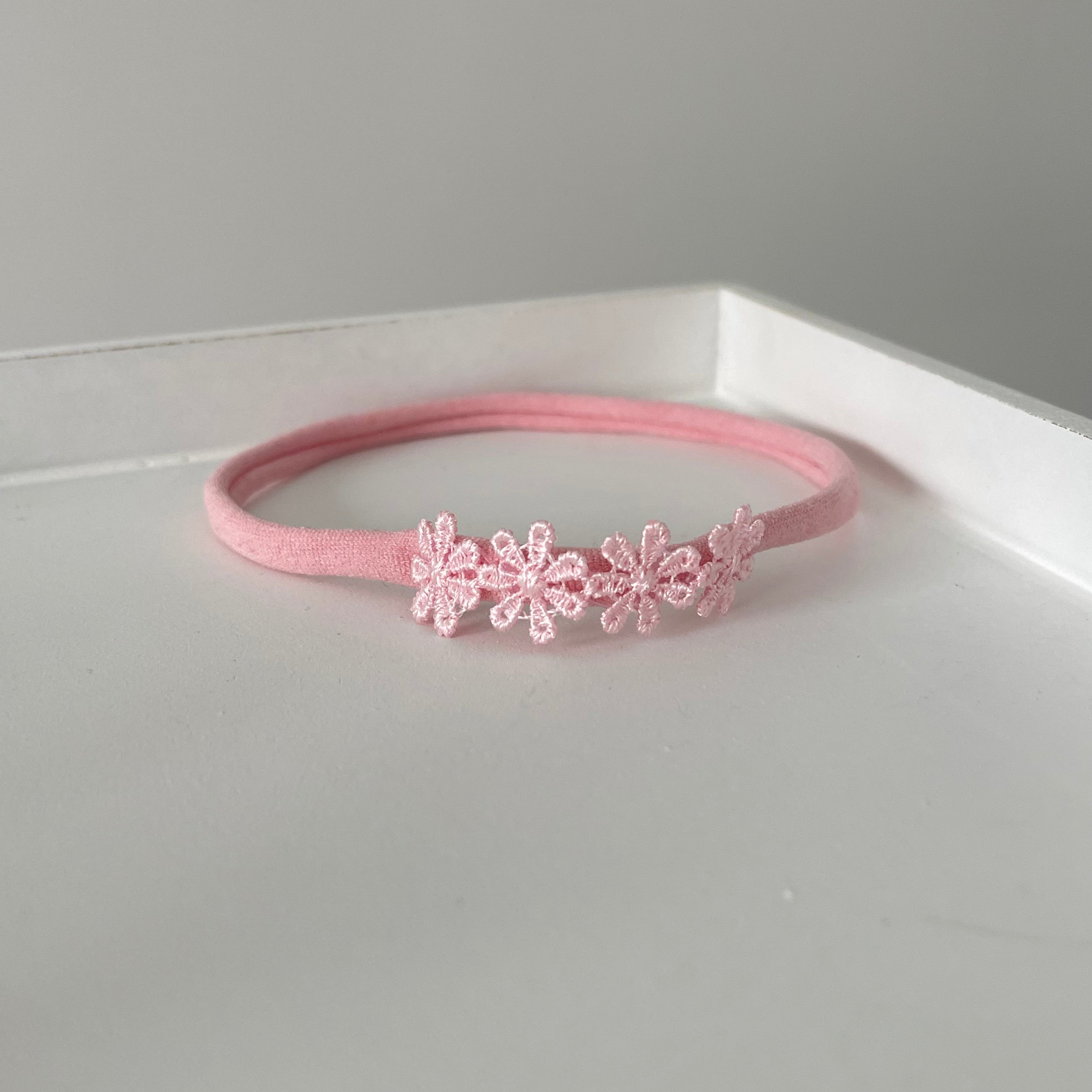 Delicate pink daisy flowers | Clip or headband