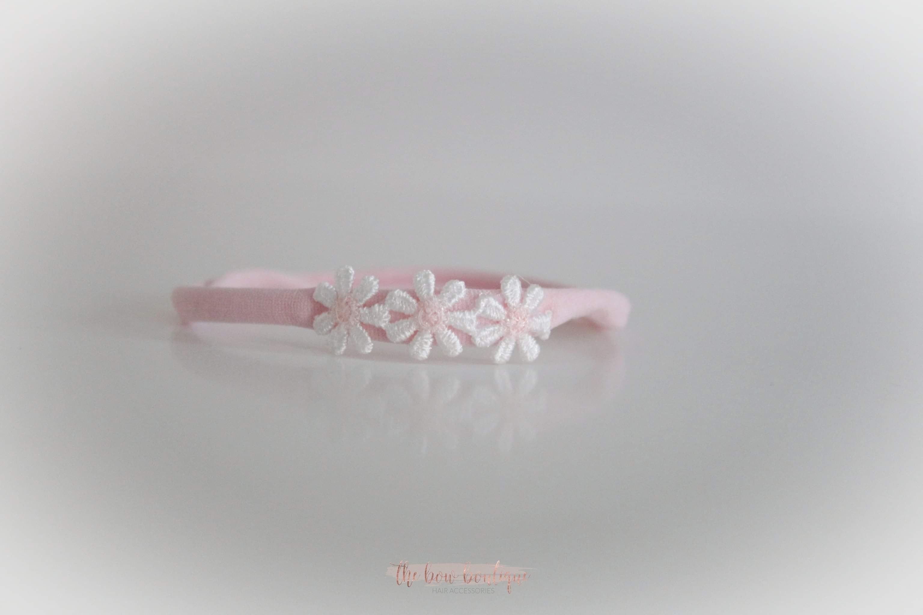 Delicate pink daisy flowers | Clip or headband